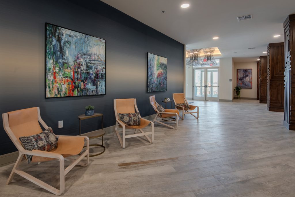 sitting area with seating and wall art decor