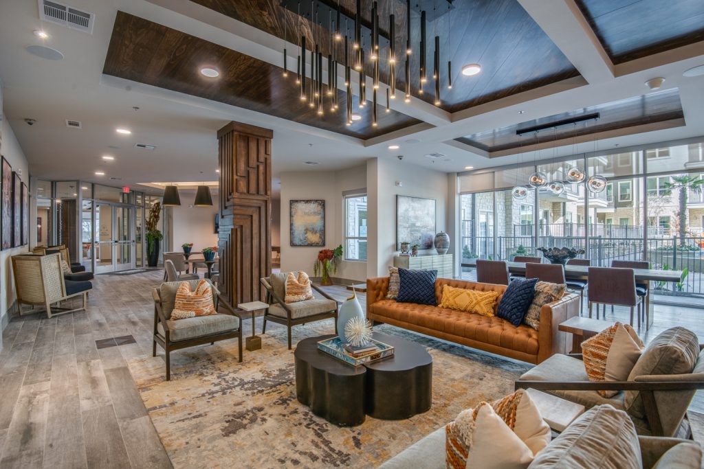 clubhouse area with lots of seating, decor, and overhead lighting