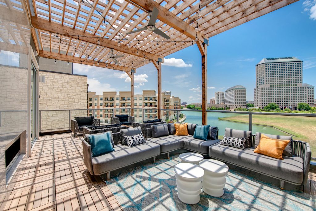 outdoor patio lounge with seating and overhead cover